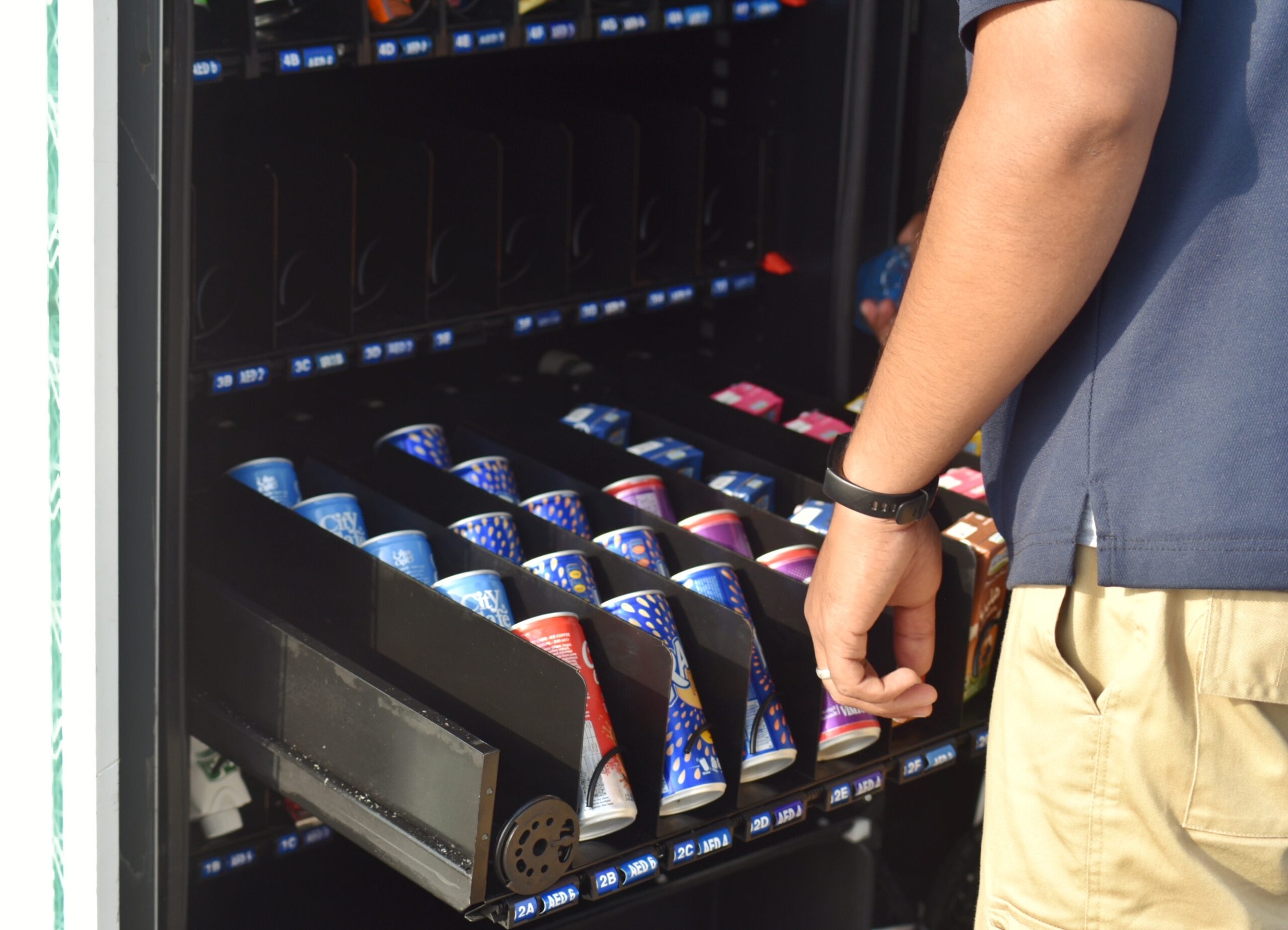 Local snack vending machine being stocked by suppl 2025 03 09 00 08 14 utc (1)